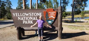 The author in front of the Yellowstone sign.